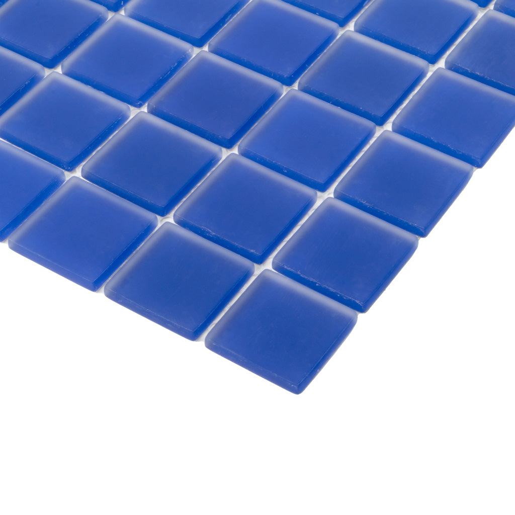 matte cobalt blue 12x12 glass mosaic tiles arranged in a grid pattern