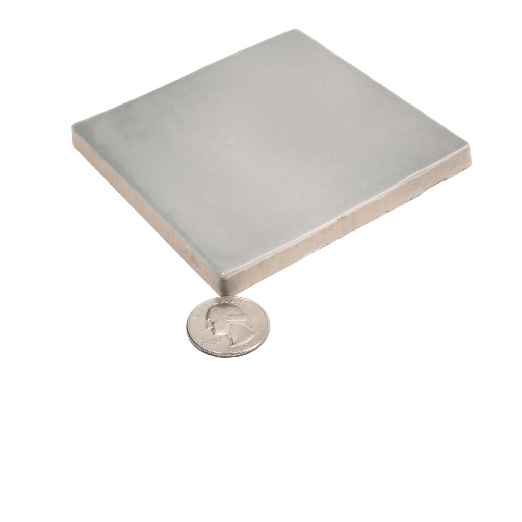 Benjamin Moore Smoke 4x4 glossy ceramic tile in muted gray color with smooth finish