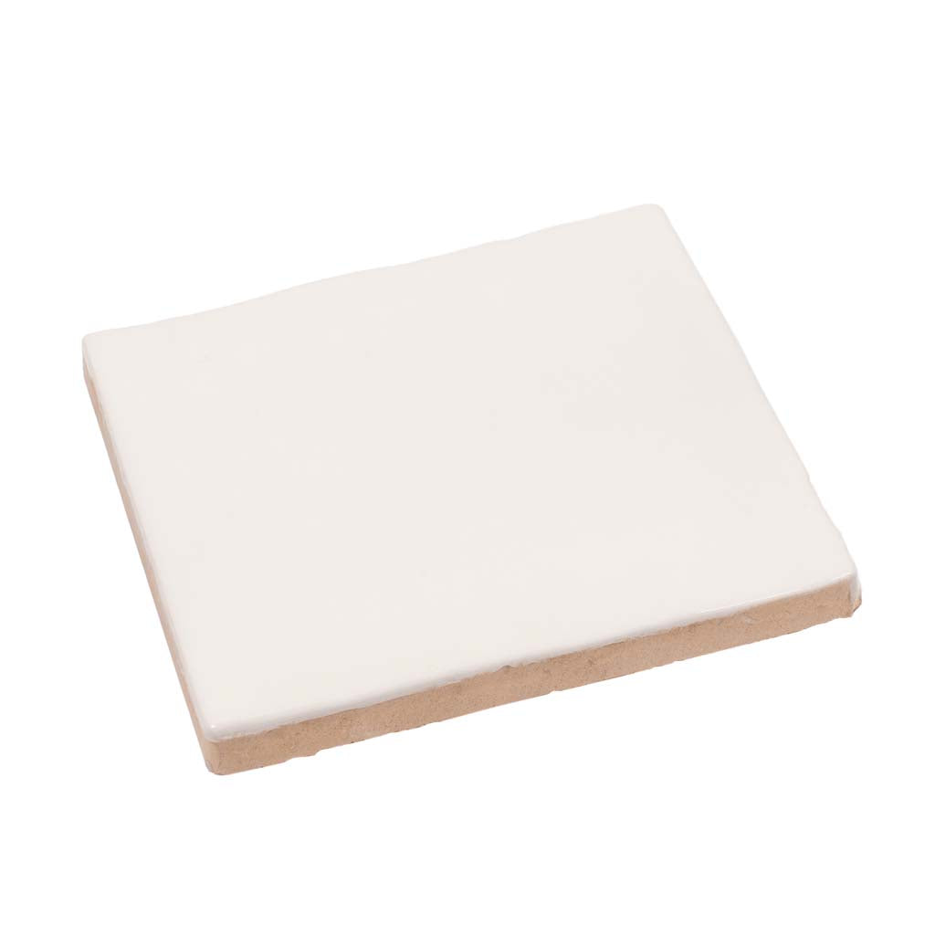 Glossy ivory white 4x4 ceramic tile with smooth surface and natural edges