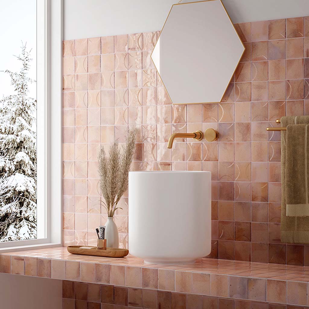 pink 4x4 glossy ceramic subway deco tile with embossed semi-circle pattern on bathroom wall