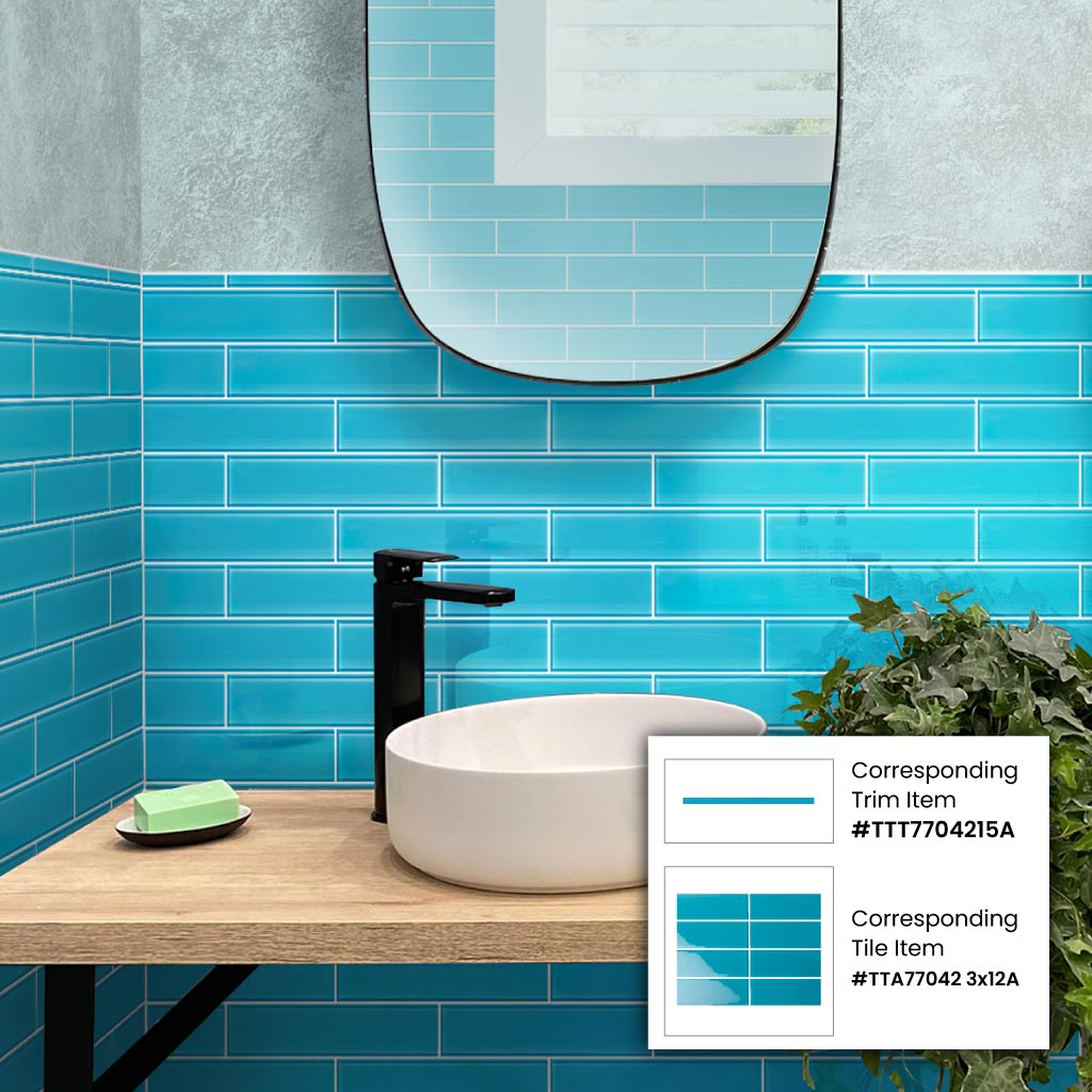 sapphire blue glossy glass subway tiles arranged in horizontal 3x12 pattern with clean grout lines