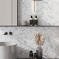 White with Gray-Gold 11 x 12 Polished Porcelain Herringbone Tile