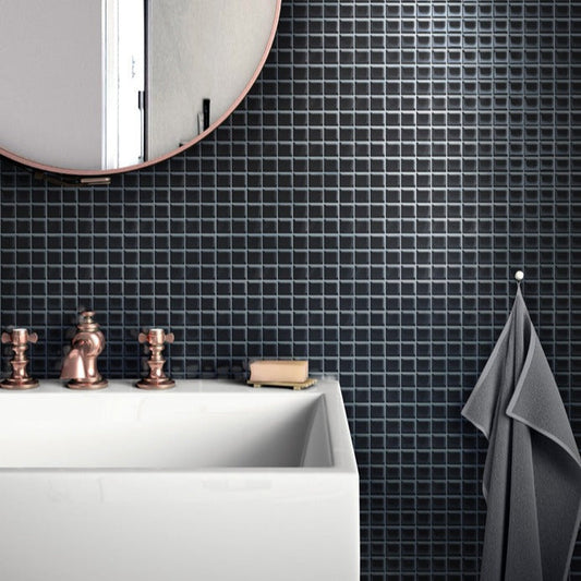 black glossy glass mosaic tiles in 12x12 layout with reflective surface