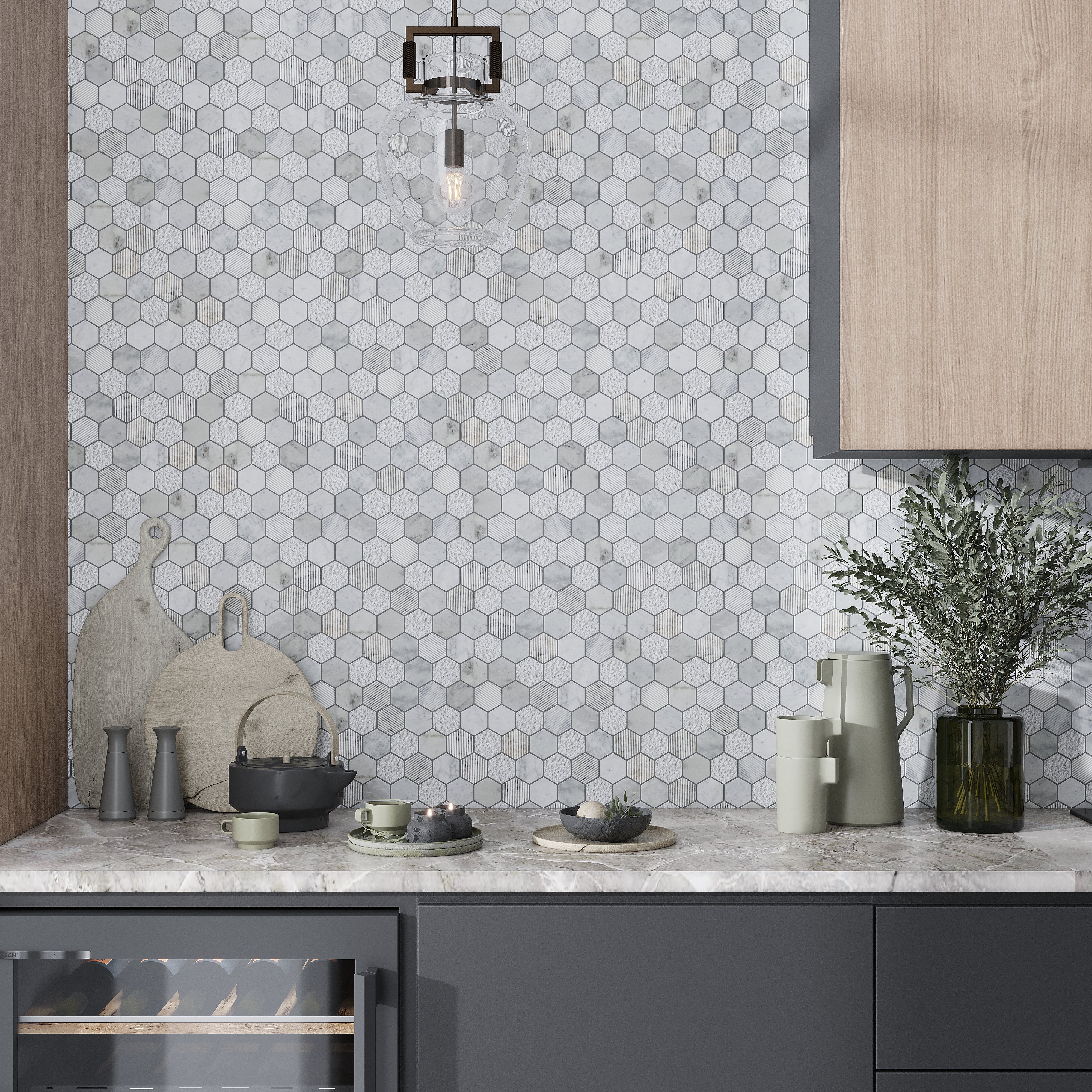 white marble hexagon kitchen backsplash tile with black and light wood cabinets