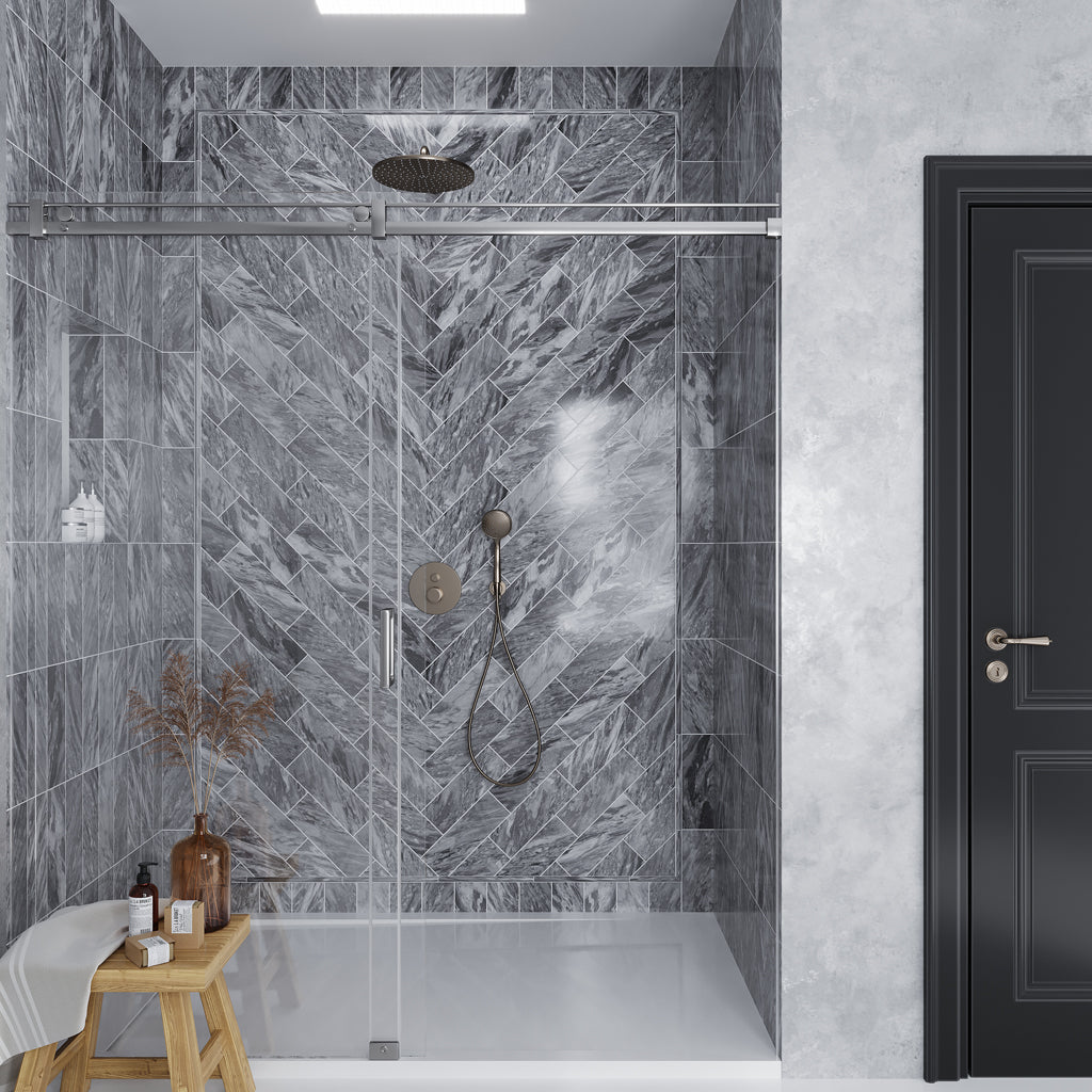 Polished gray 4x12 Bardiglio Nuvolato marble subway tiles with herringbone pattern in shower wall