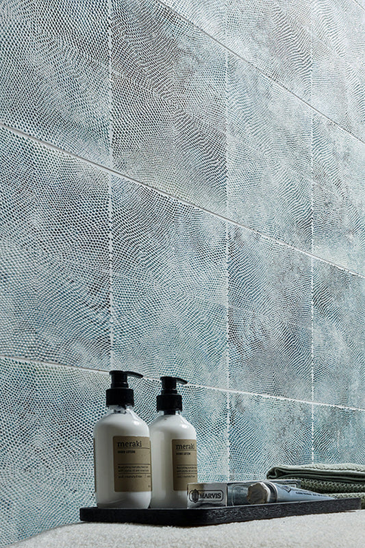 blue green 12x36 ceramic tile with dotted texture and third firing finish on wall