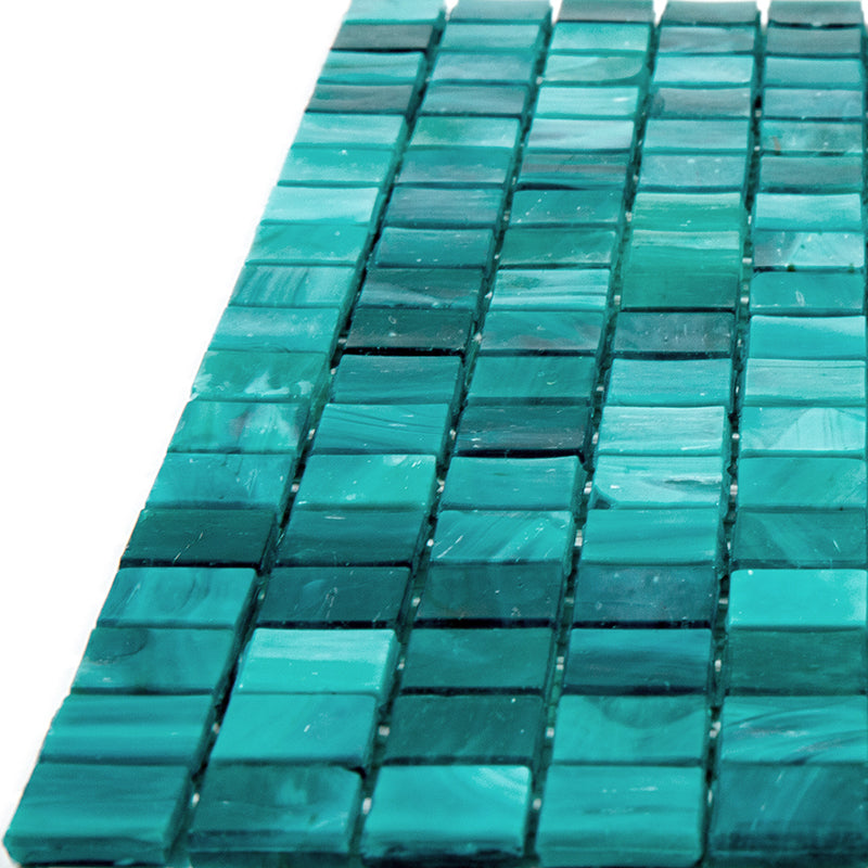 Cerulean green glossy glass mosaic tile sheet with square tiles in various shades of blue and green