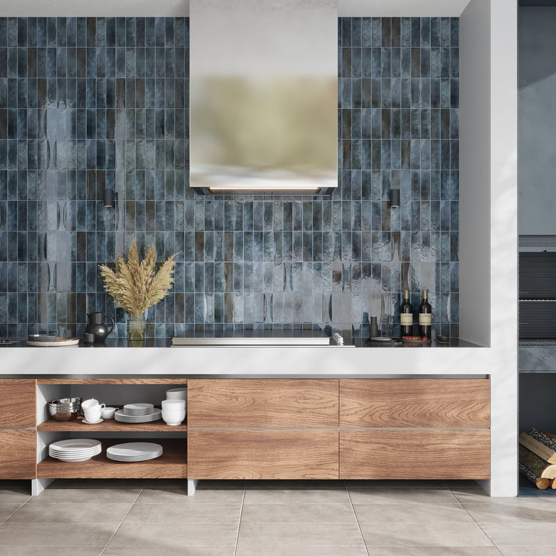Glossy ceramic subway tile in spruce blue with decorative textured pattern