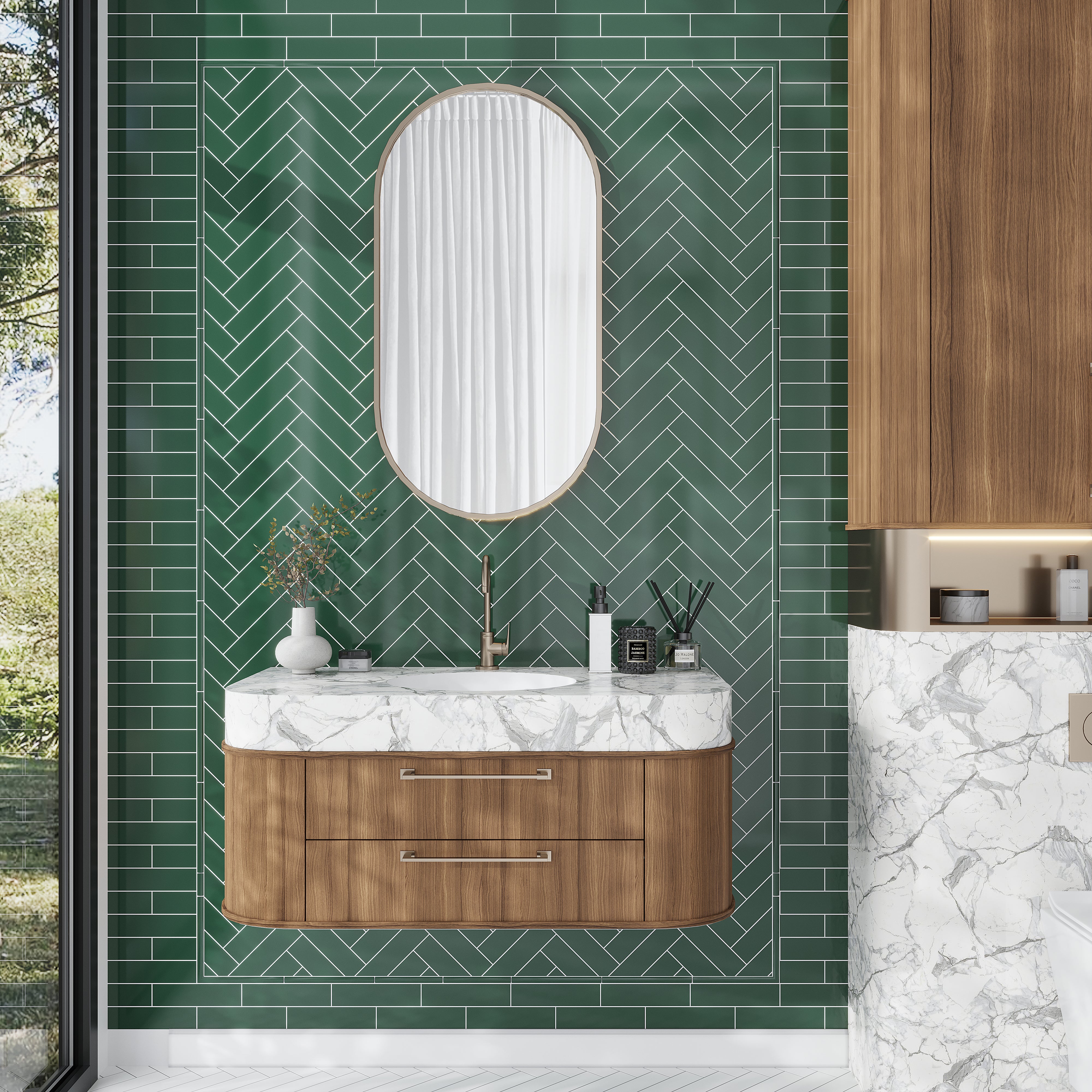 dark green herringbone subway tile in bathroom with floating vanity and mirror