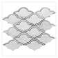 Polished Bianco Carrara marble mosaic tile with soft white and gray tones in decorative scallop pattern