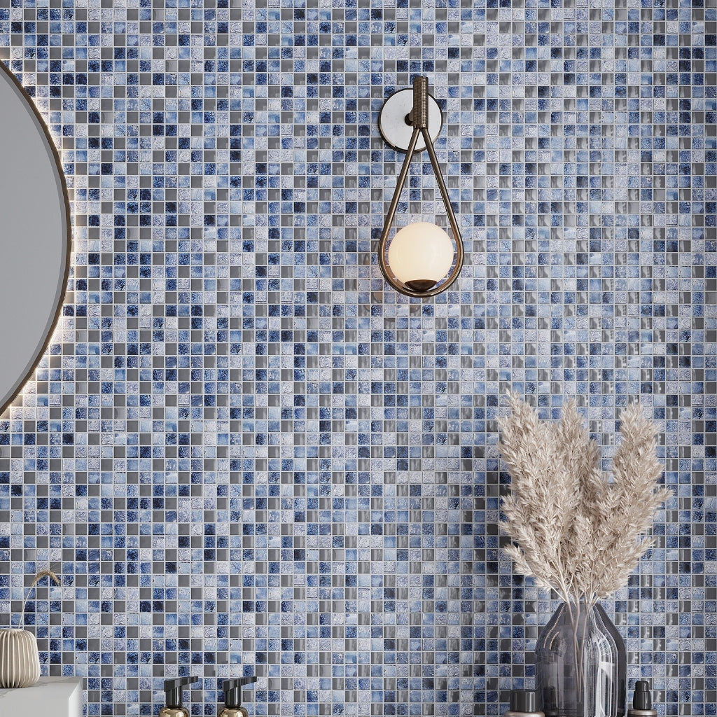 gray and blue square mosaic travertine tile bathroom wall with round mirror and decorative vase